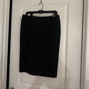 Elegant Black ICO Women's Skirt Size 10P
25 in long